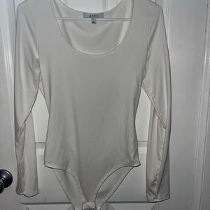White long sleeve body suit.